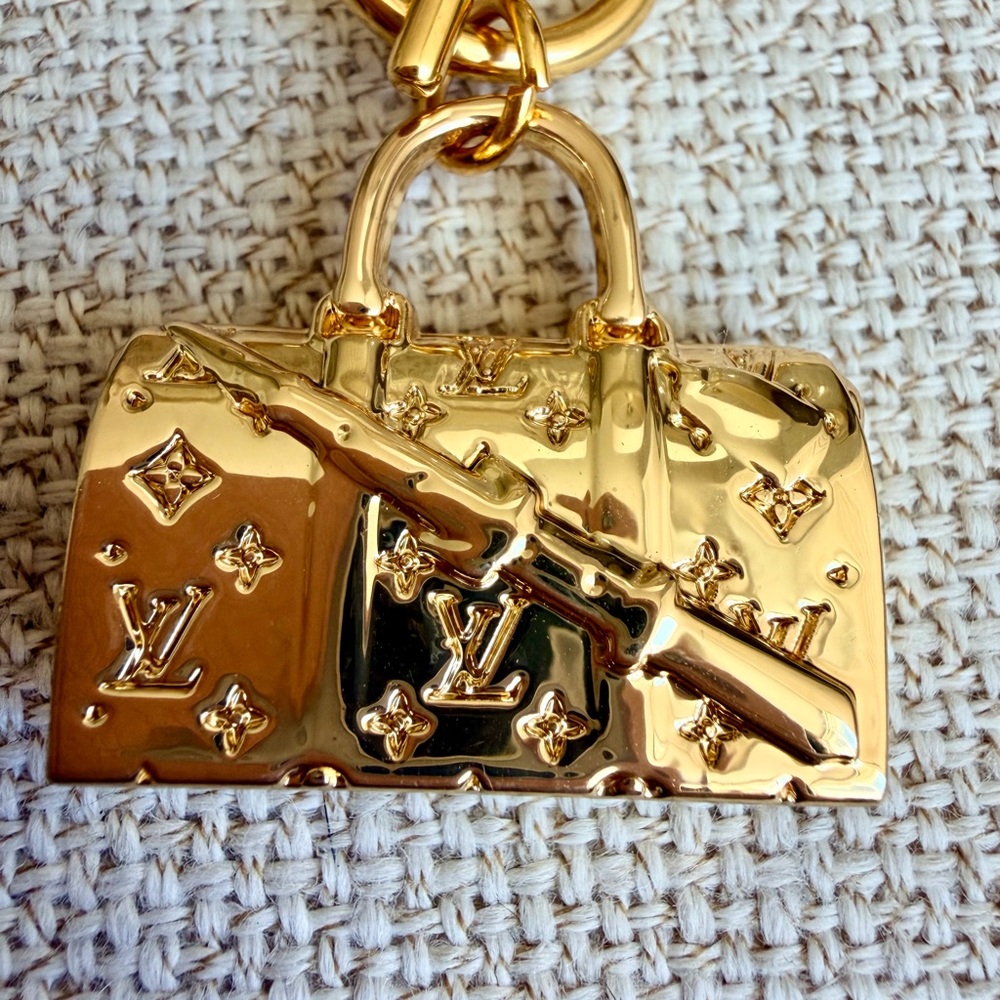 Upcycled keepall Gold Bag Charm on chucky toggle necklace